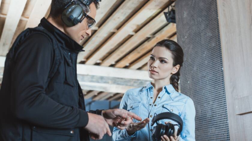 Essential safety gear for a gun range visit, including eye and ear protection, gloves, and range bag.